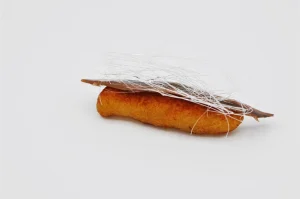 Patata dauphine, con tomate y anchoa